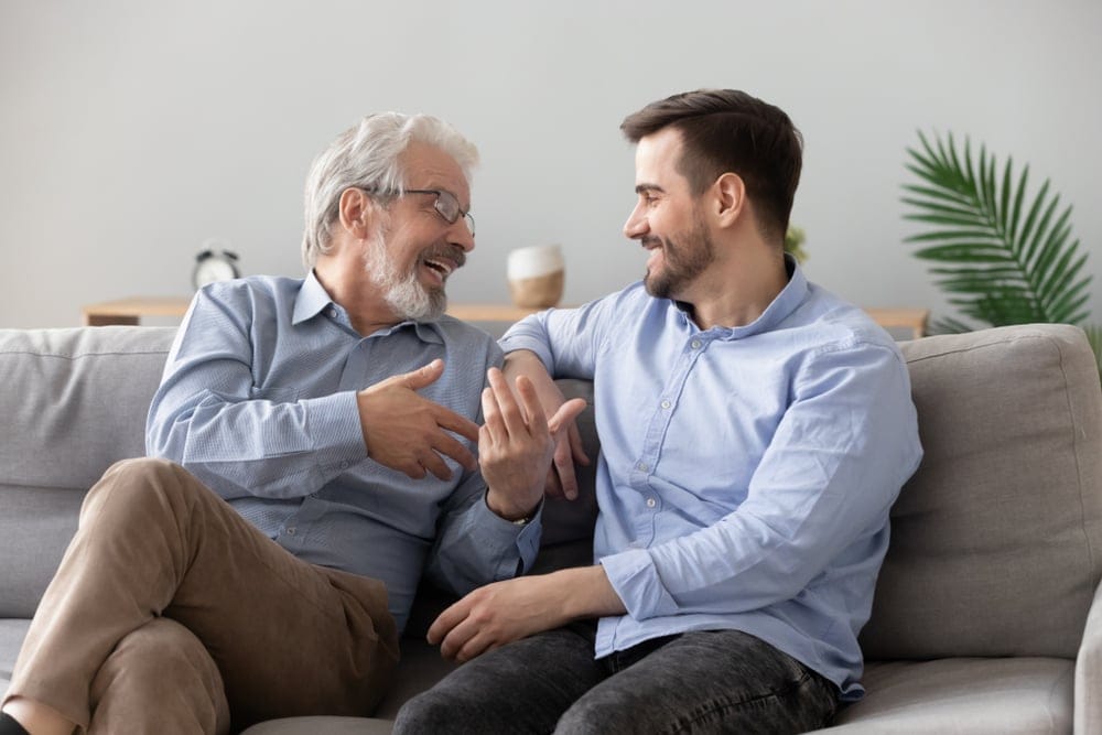 man talking to his dad