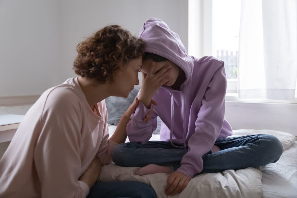 Mother and daughter having a talk.