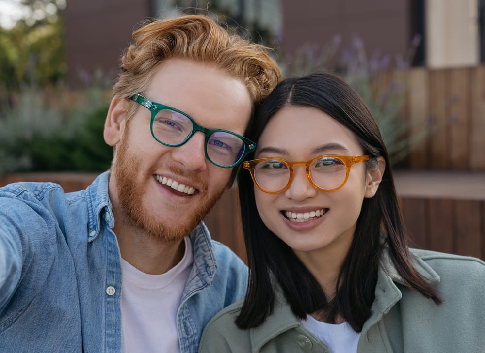 A smiling couple on a walk.