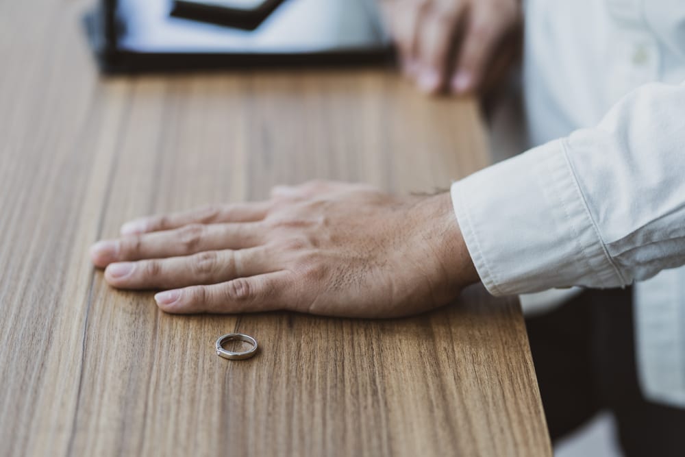 Man removed his wedding band.