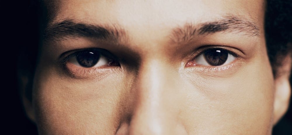 Closeup of man's eyes.