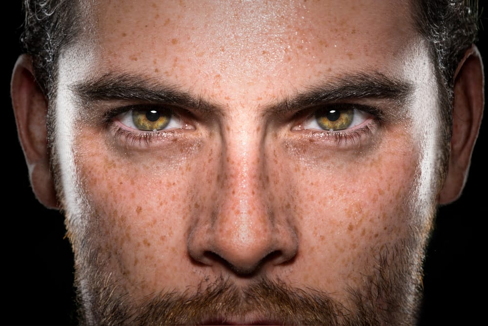 Man intensely awake.