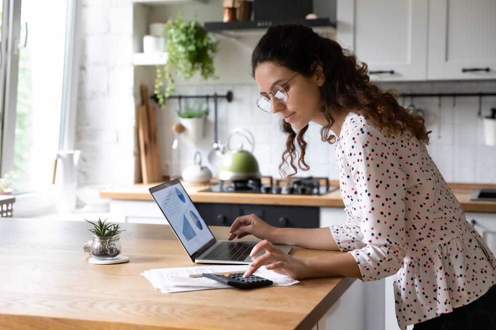 Woman working out her finances.