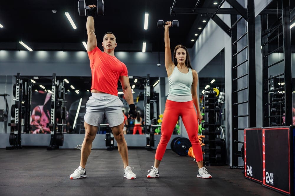 Man and woman in th gym.