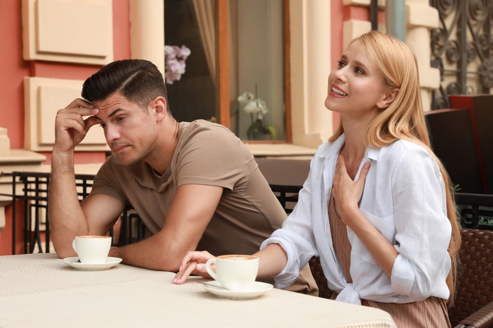 Man listening to a woman talk too much.