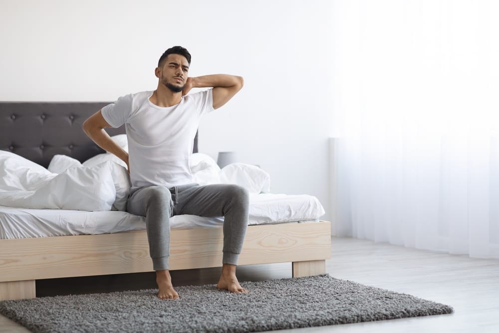 Man waking up from a nap.