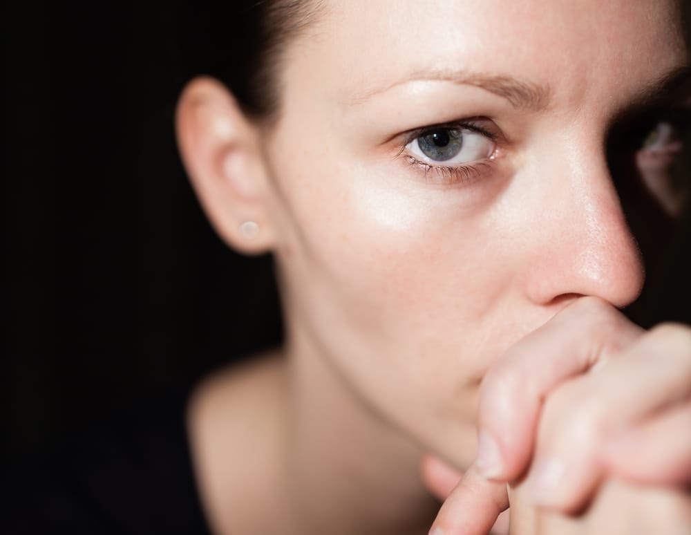 Woman looking sad.