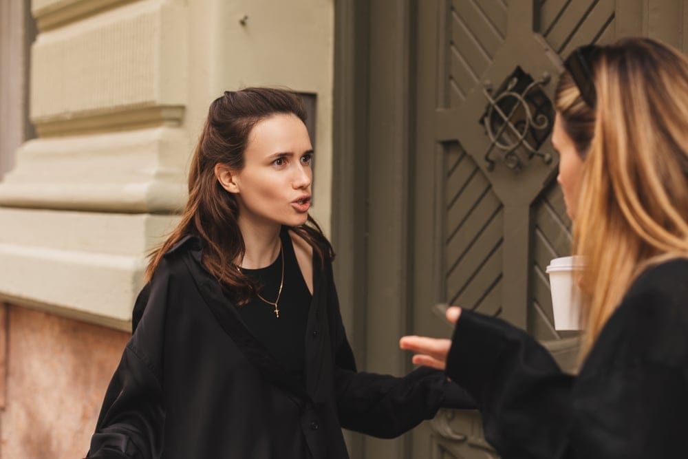 friends arguing outside