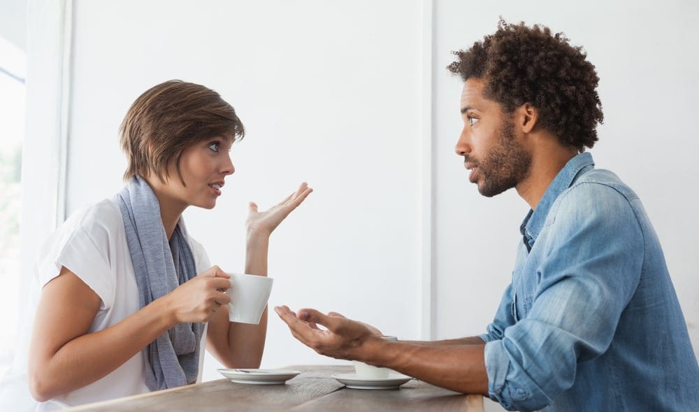 Man and woman having an intense conversation.