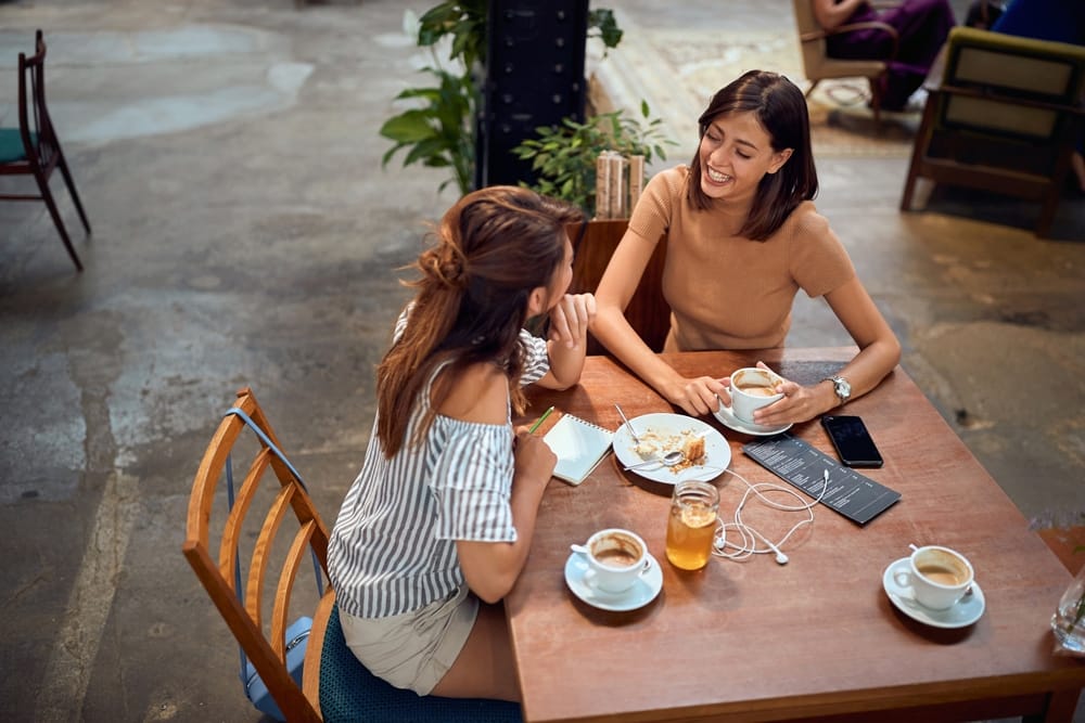 Girlfriends chatting.