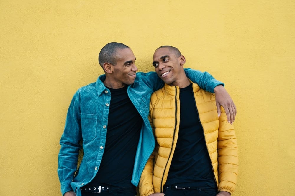 Two adults hugging.