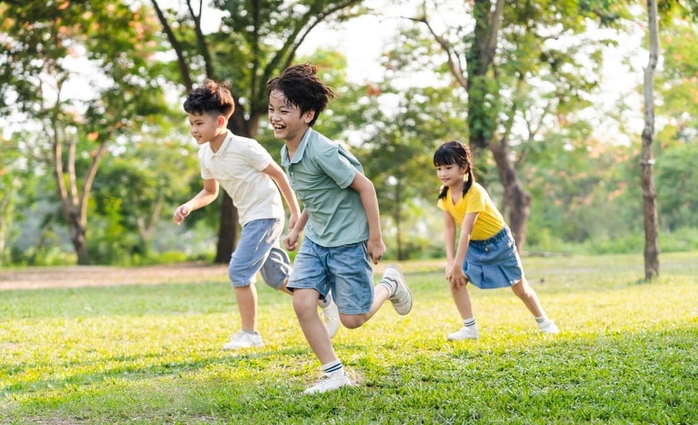 Group of children running.