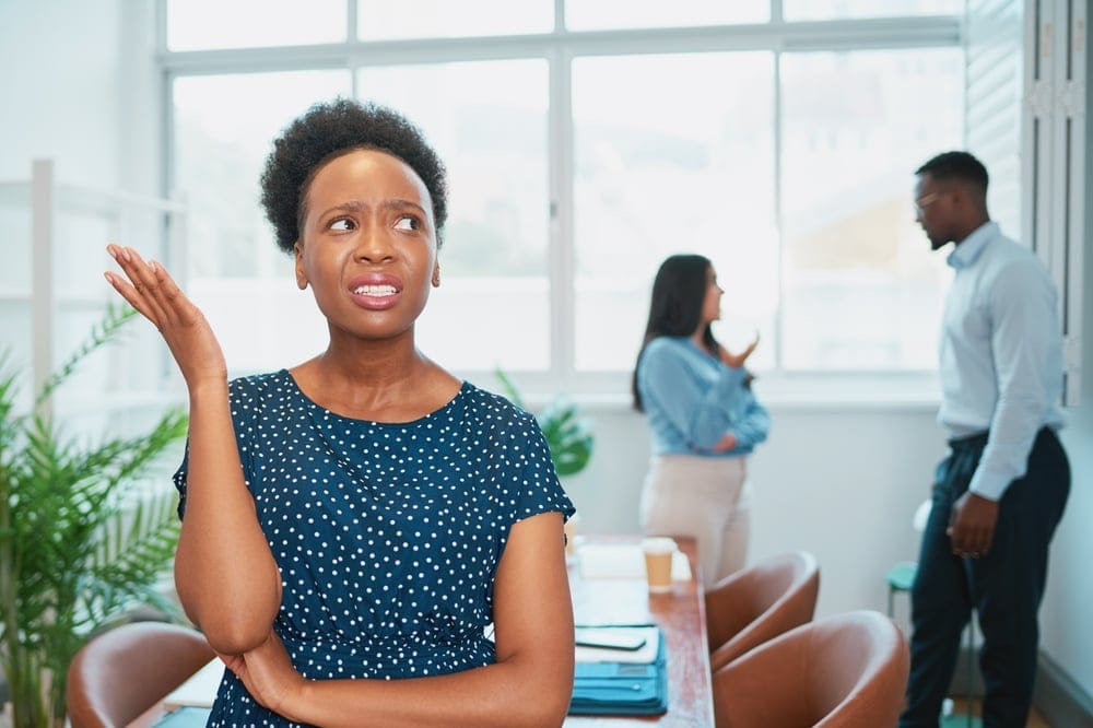 Businesswoman talking to her coworkers.