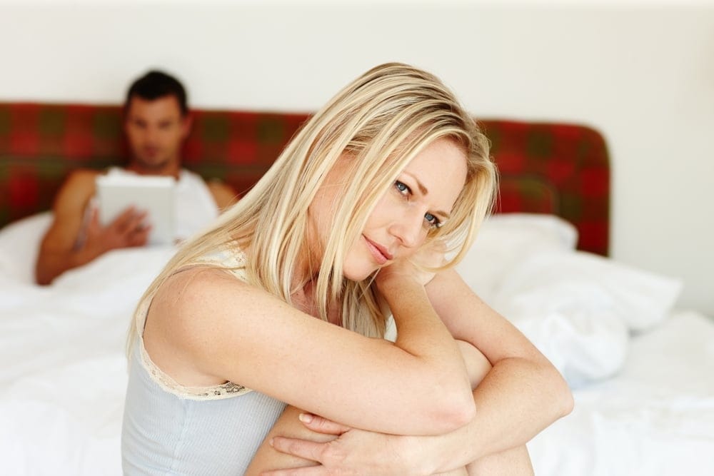 Couple not speaking with one another.