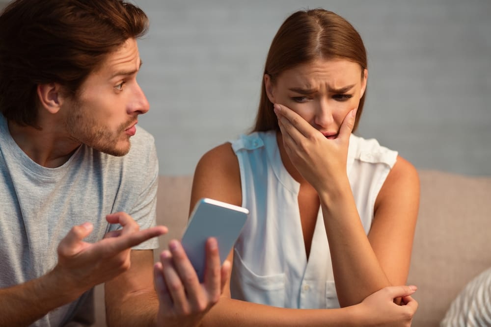 Man berating his girlfriend.