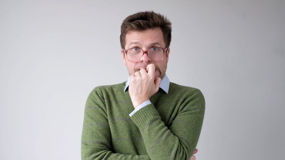 Man looking very anxious with worry.