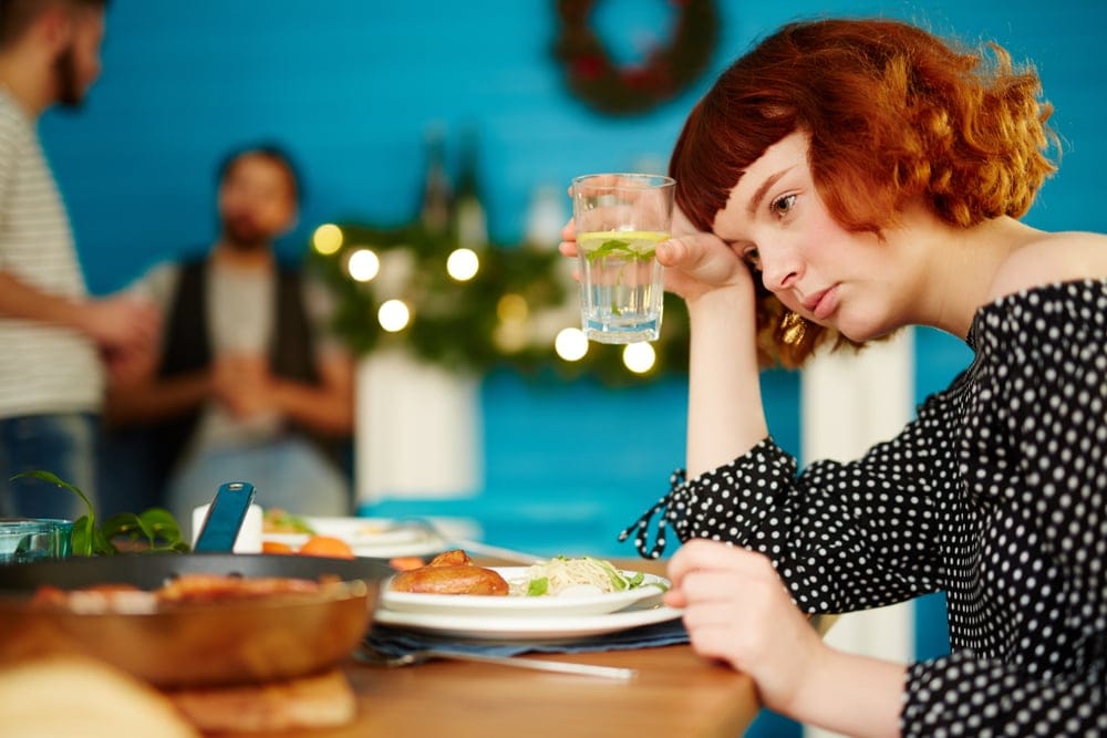 Depressed,Red-haired,Woman,Sitting,Alone,At,Table,,Drinking,Cocktail,And