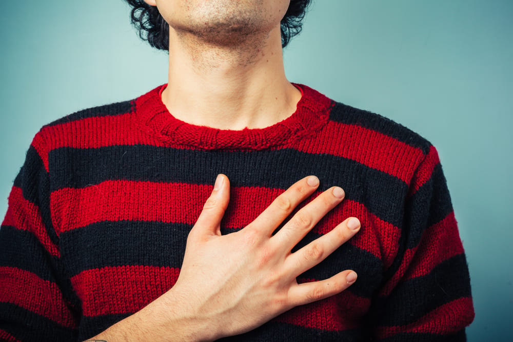 Young,Ethnic,Man,Is,Pledging,Allegience,With,His,Right,Hand