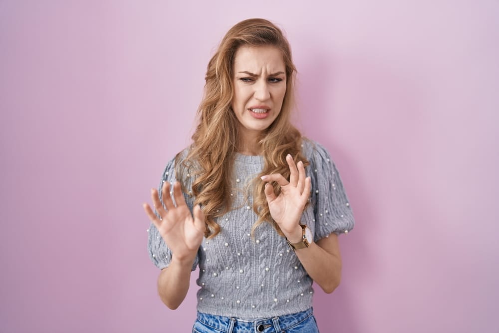 Woman looking displeased.