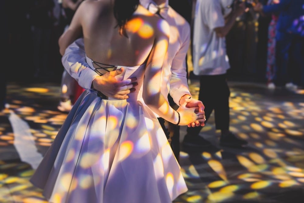 High school graduates at prom.