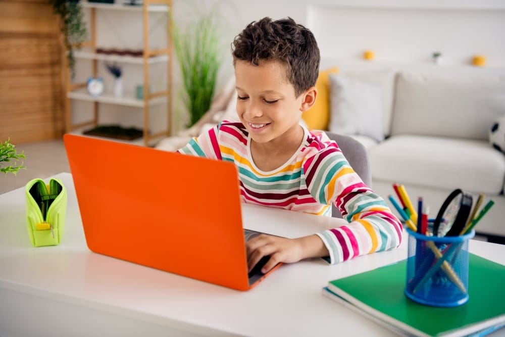 School aged child doing homework.
