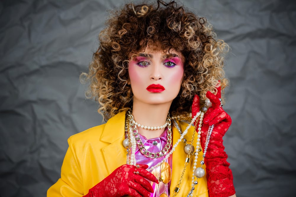 Woman dressed in 80's attire.