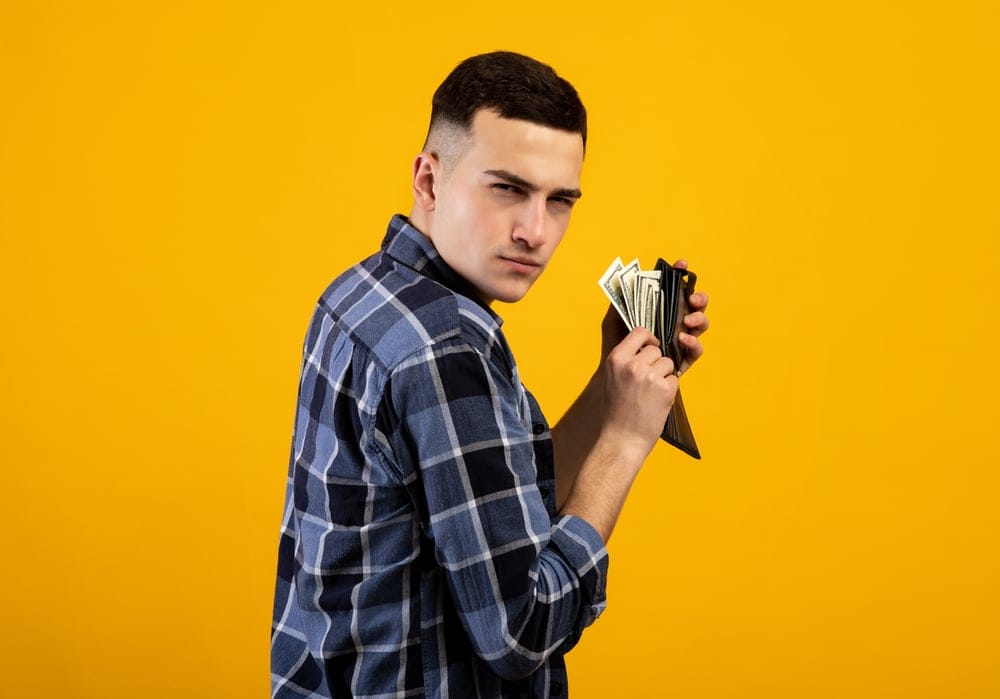 Man holding a wallet.