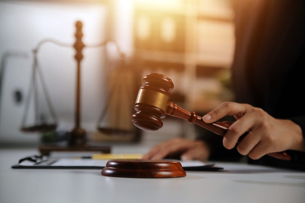 A judge banging his gavel.