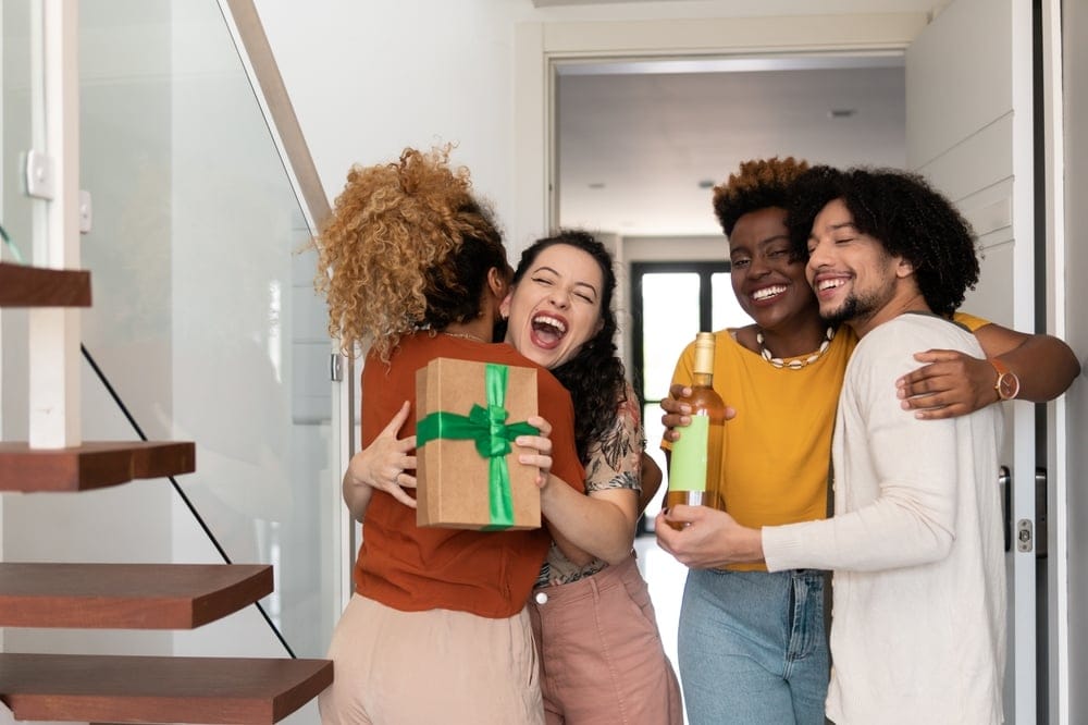 Four friends celebrating.