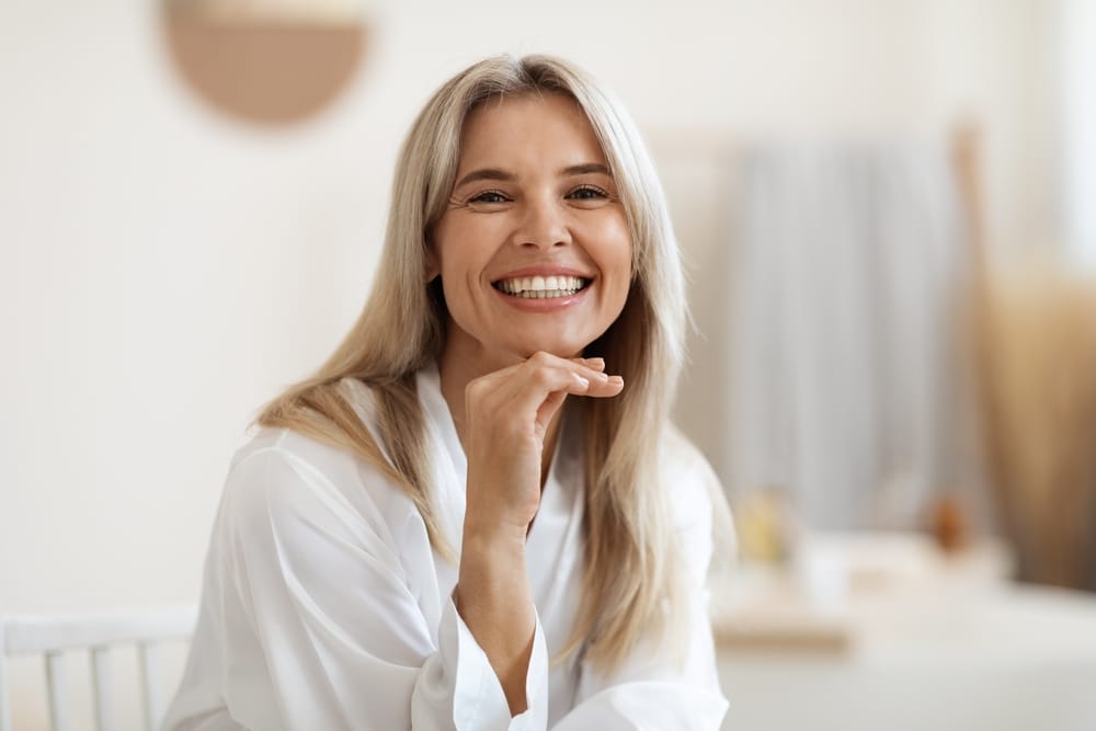 Happy smiling woman looking at camera.