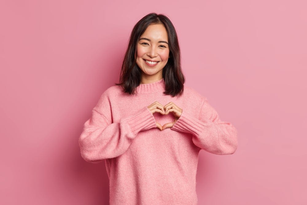 Woman showing self love.