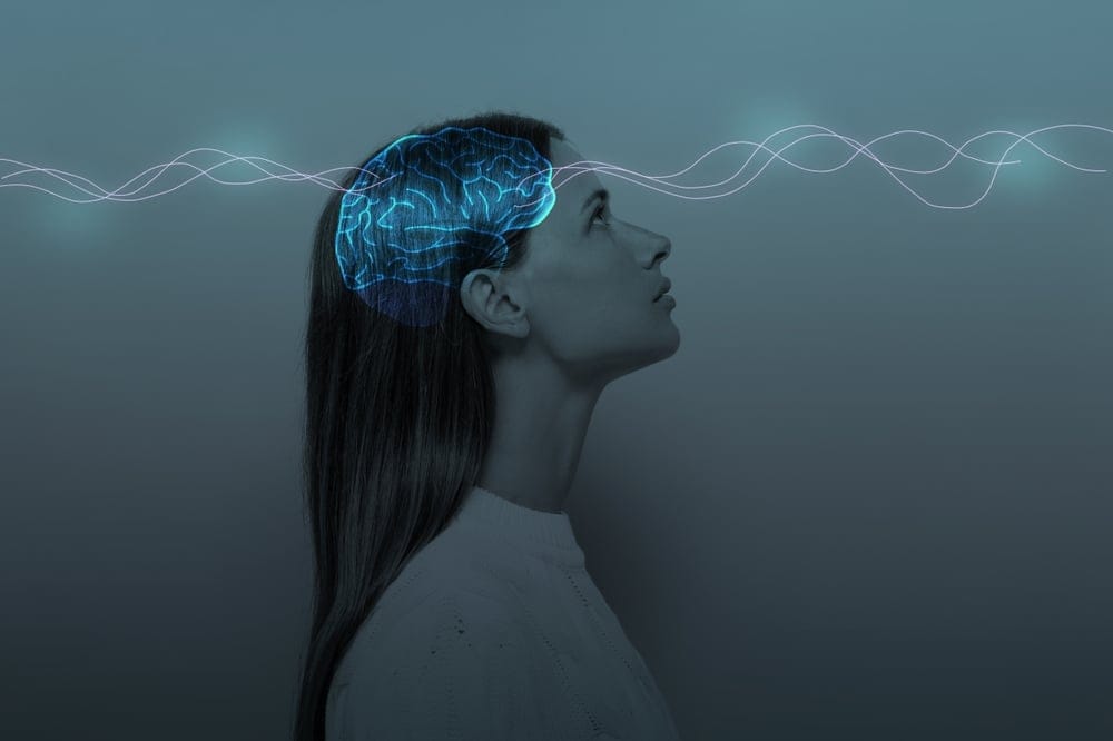 Woman with an electrical current through her head.