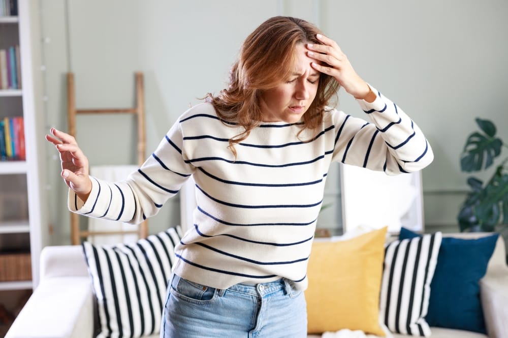 Young woman suffering from emotions.