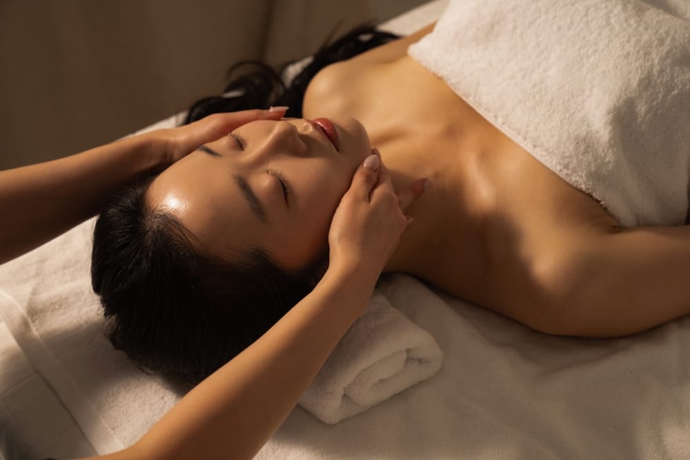 Woman having a massage at the spa.