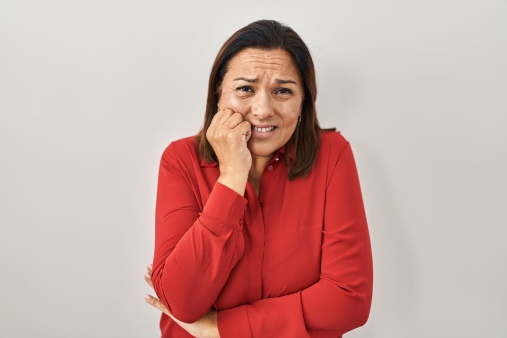 Woman looking nervous.