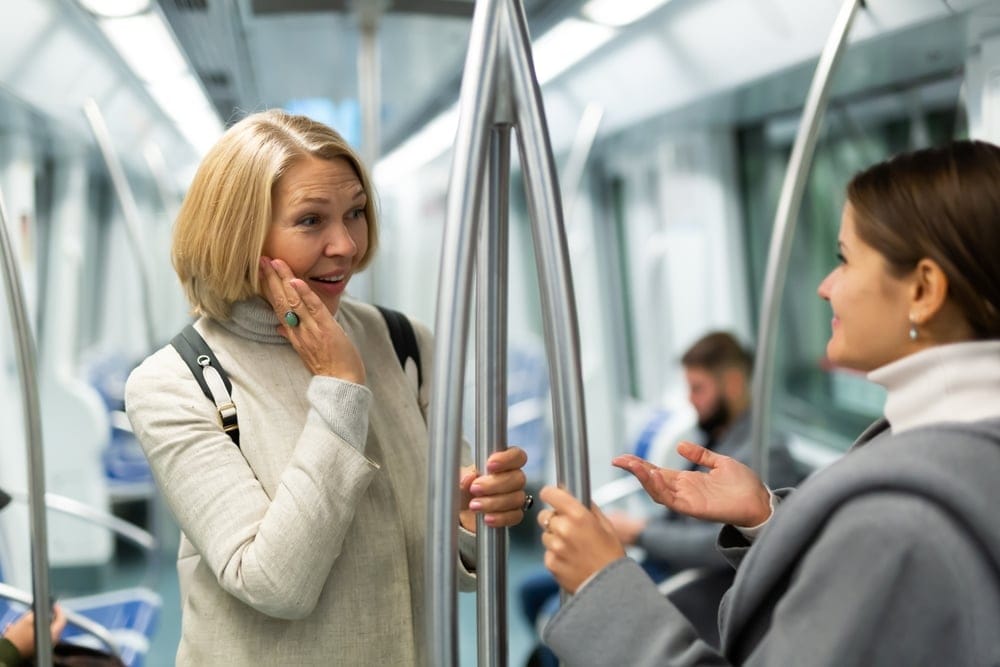 Mature woman on a train.