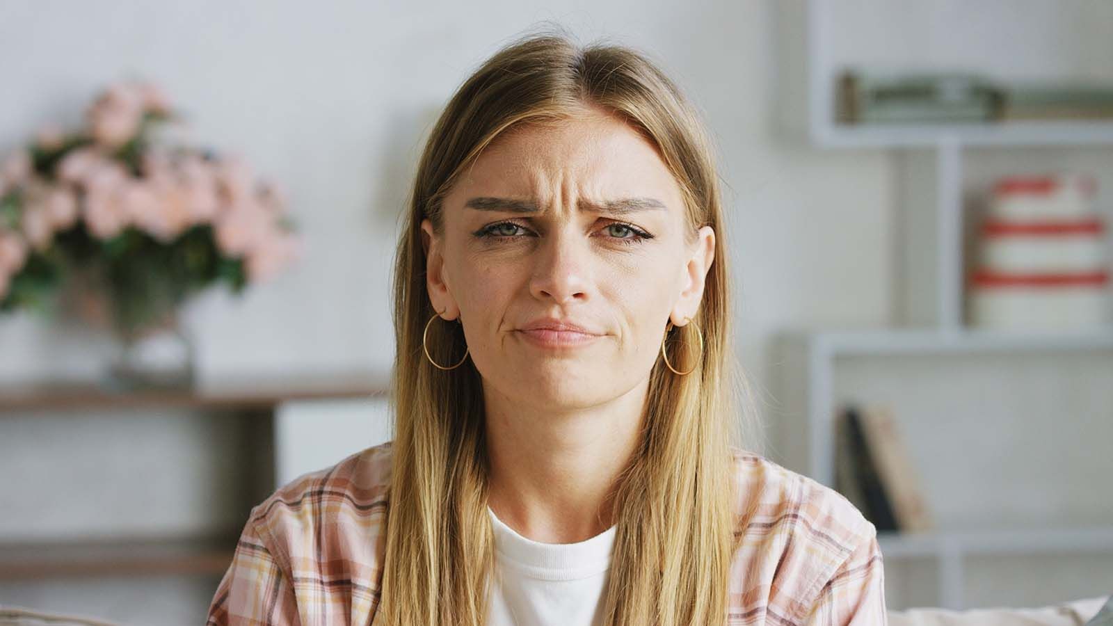 Woman disgusted with someone's behavior