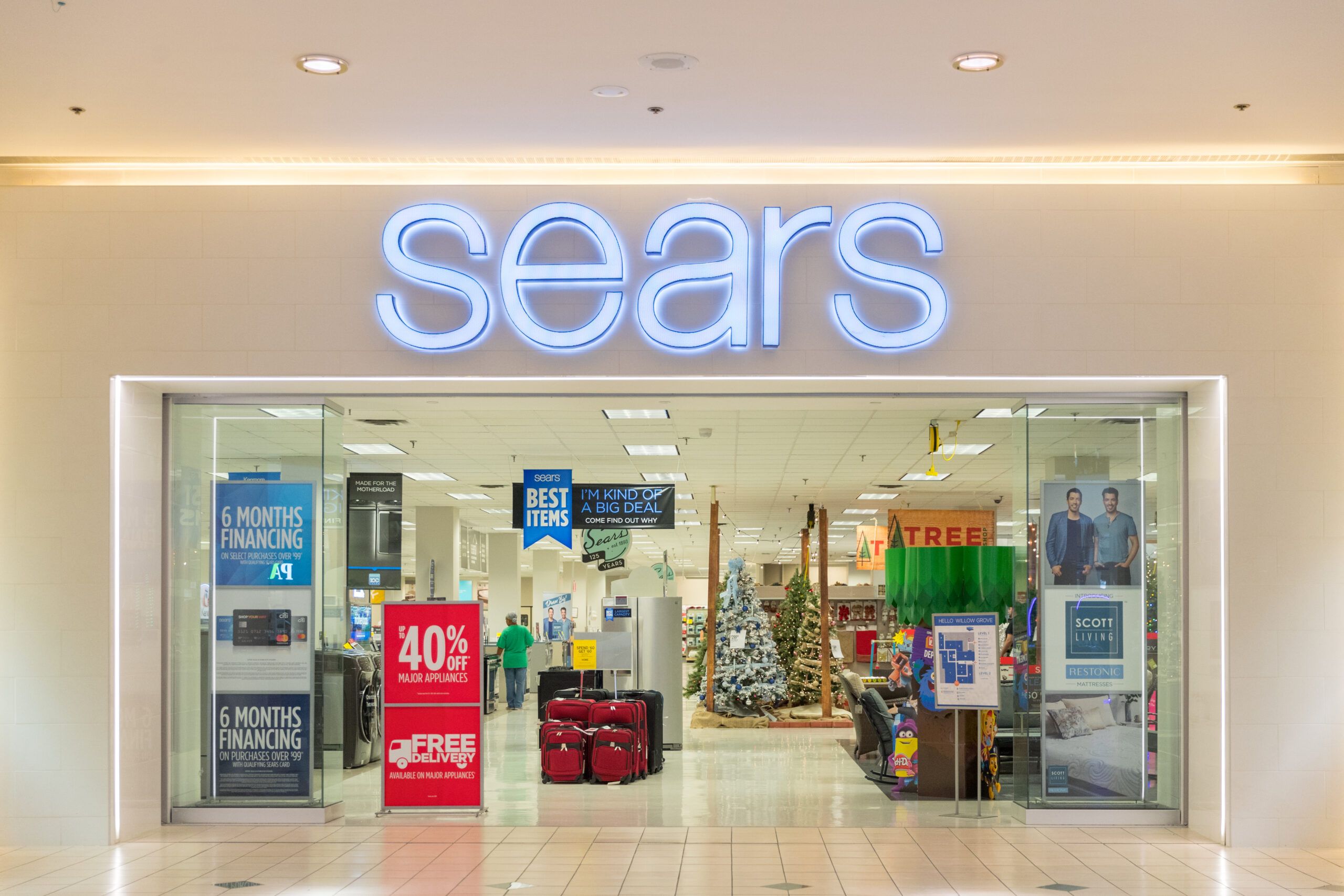 The exterior of a Sears store.