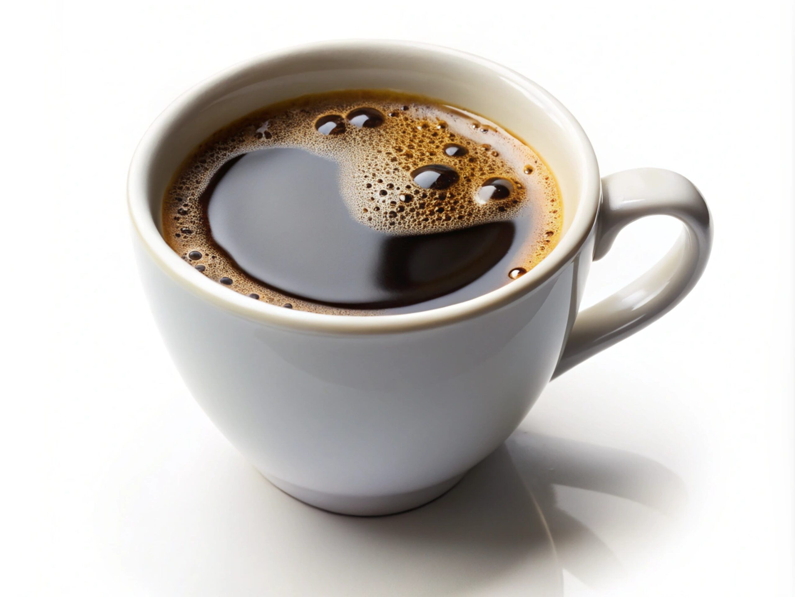 A cup of black coffee.
