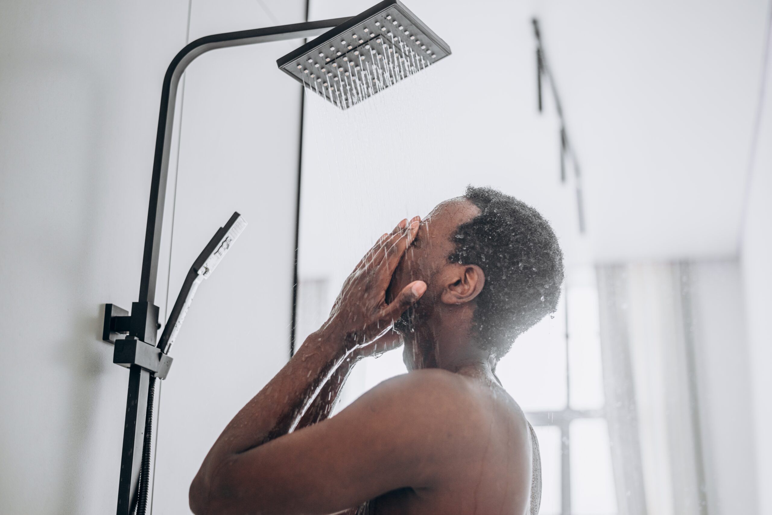A man taking a shower.