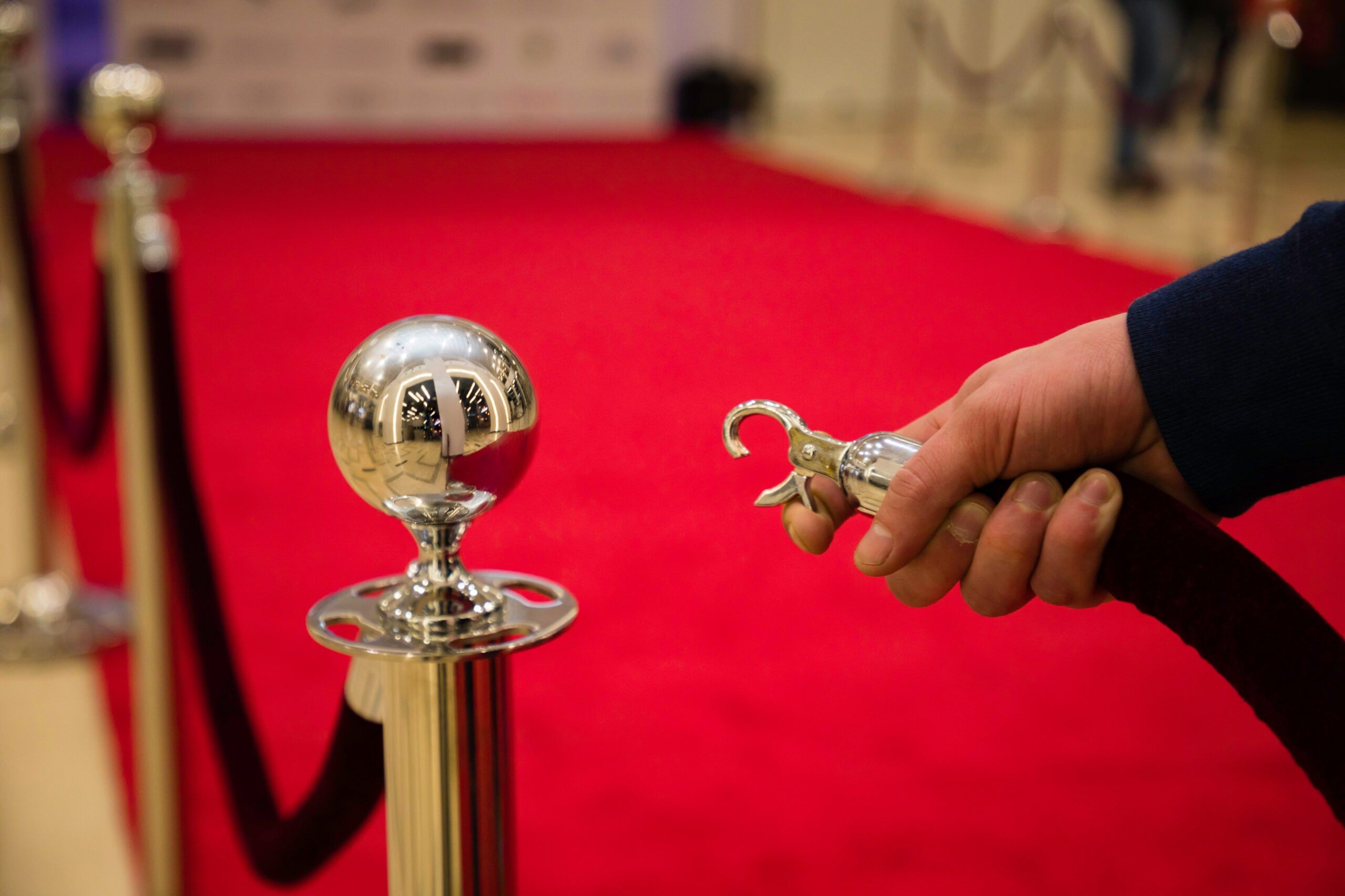 A red carpet with barriers.