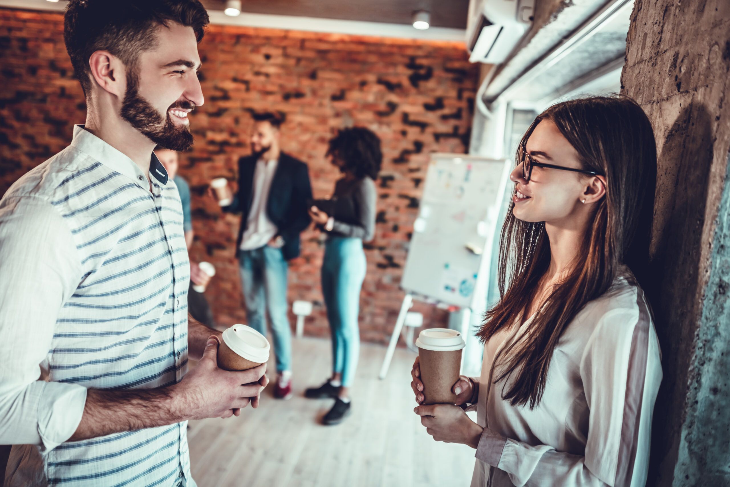Two people making small talk at a party.