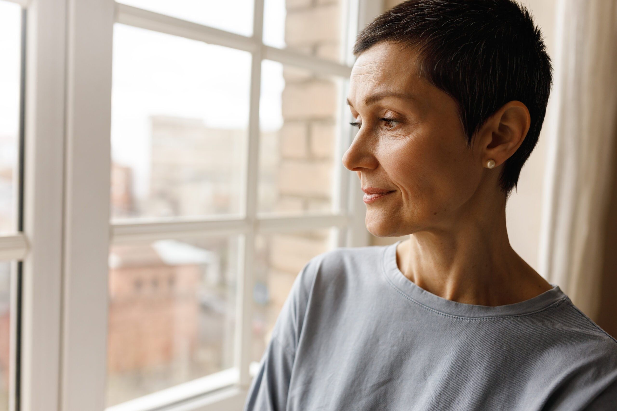 A mature woman deep in thought.