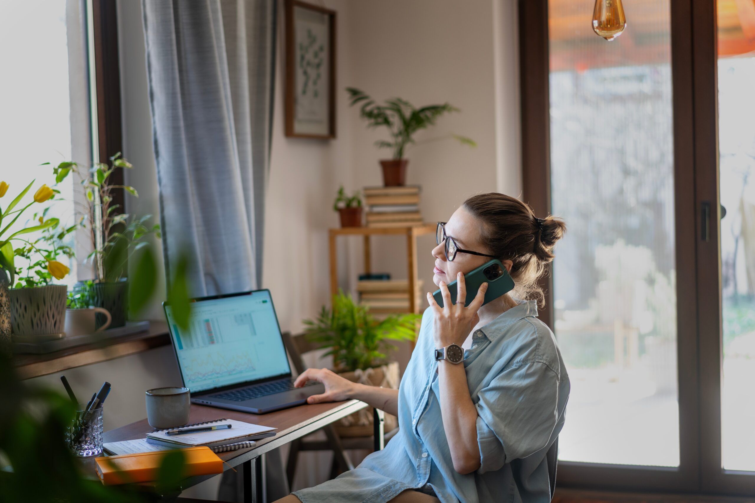 A woman working at her desk on the weekend, trying to stay busy