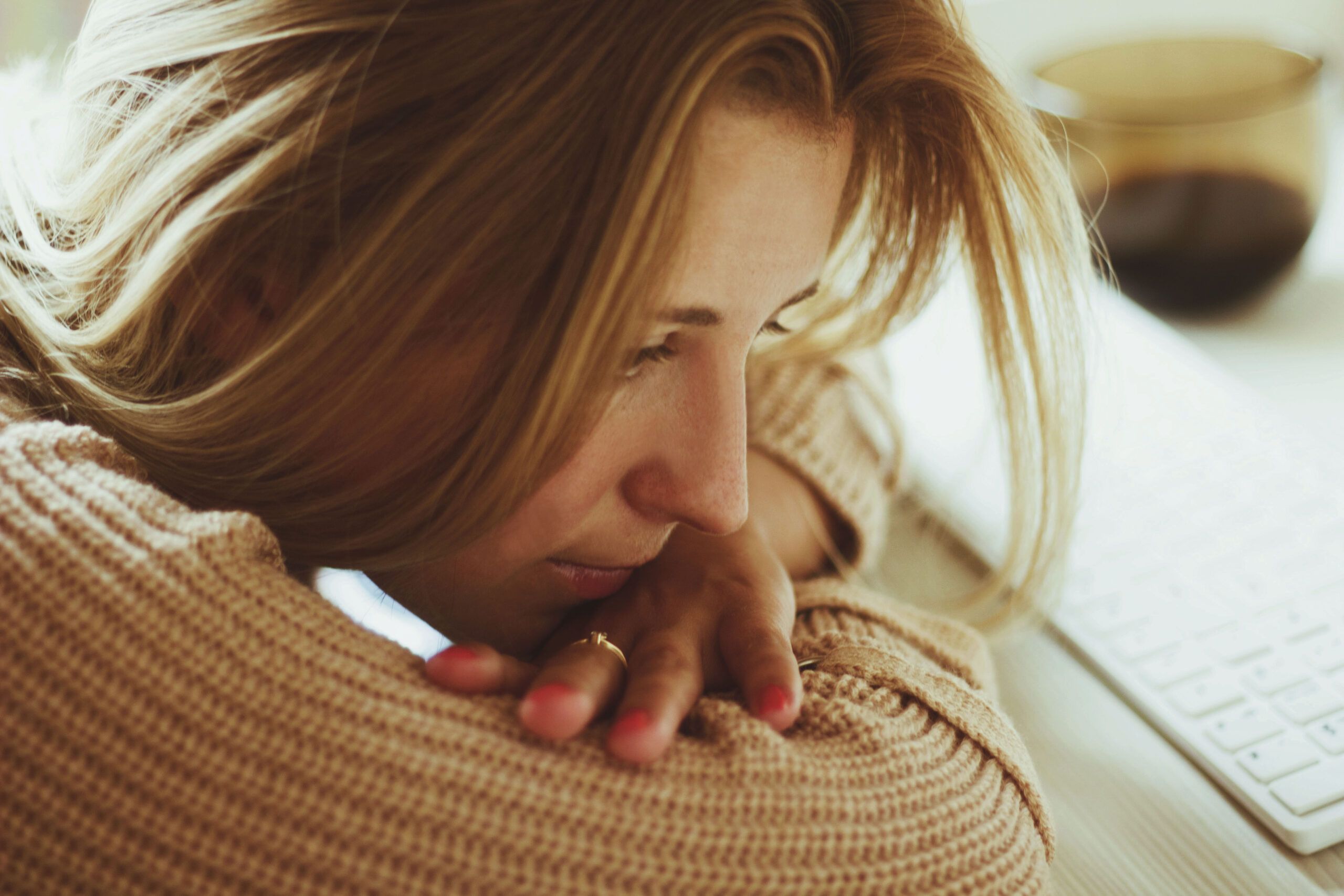 A woman feeling emotionally alone and avoiding closeness.