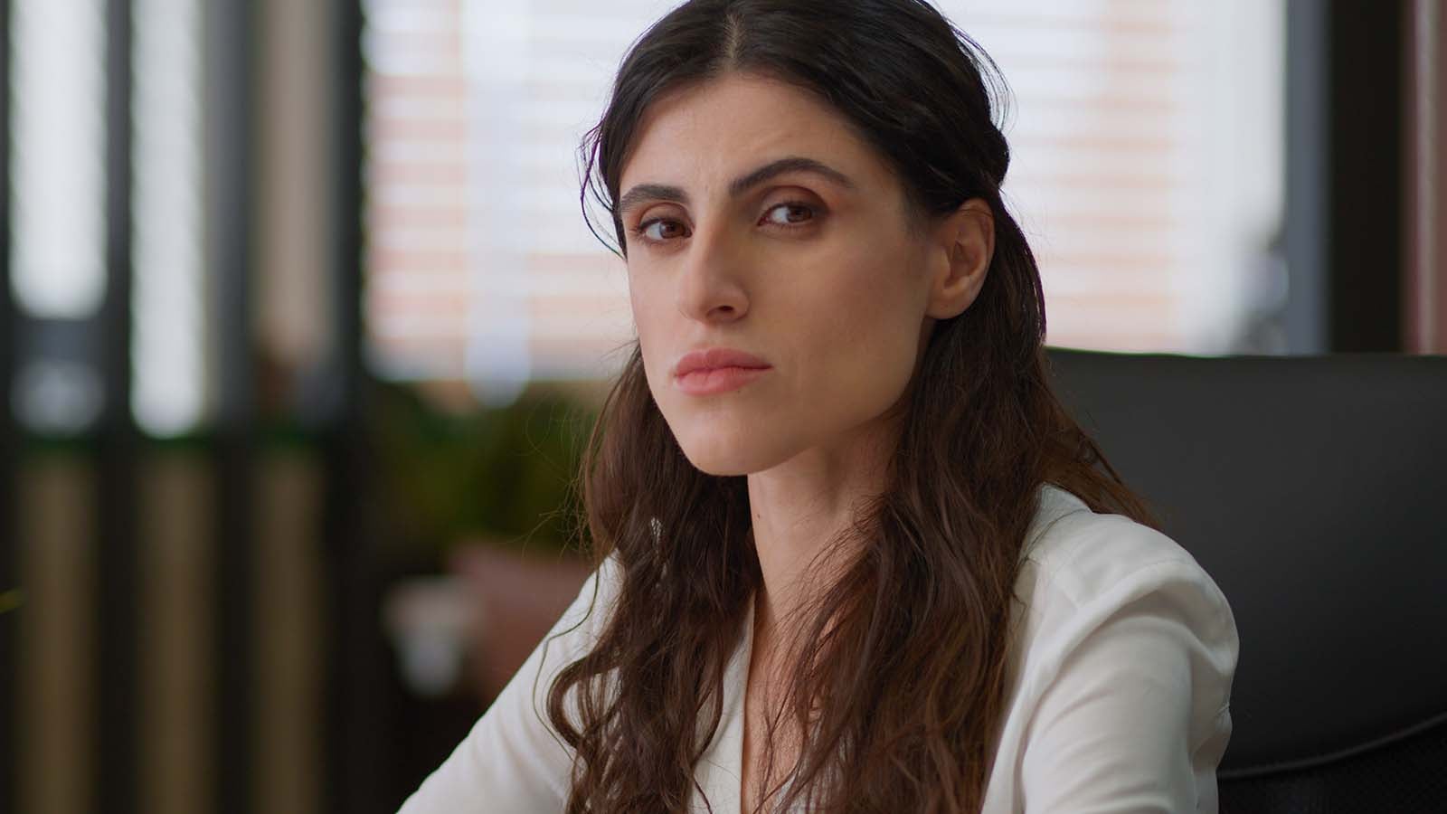 Serious businesswoman with blank stare