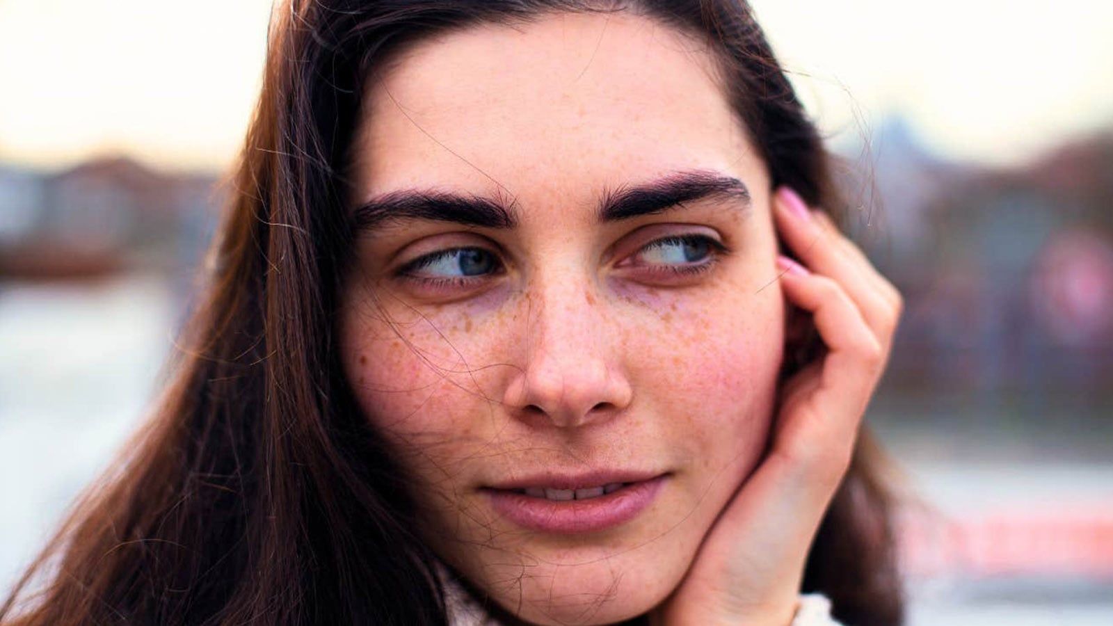 Woman side eye close up smiling