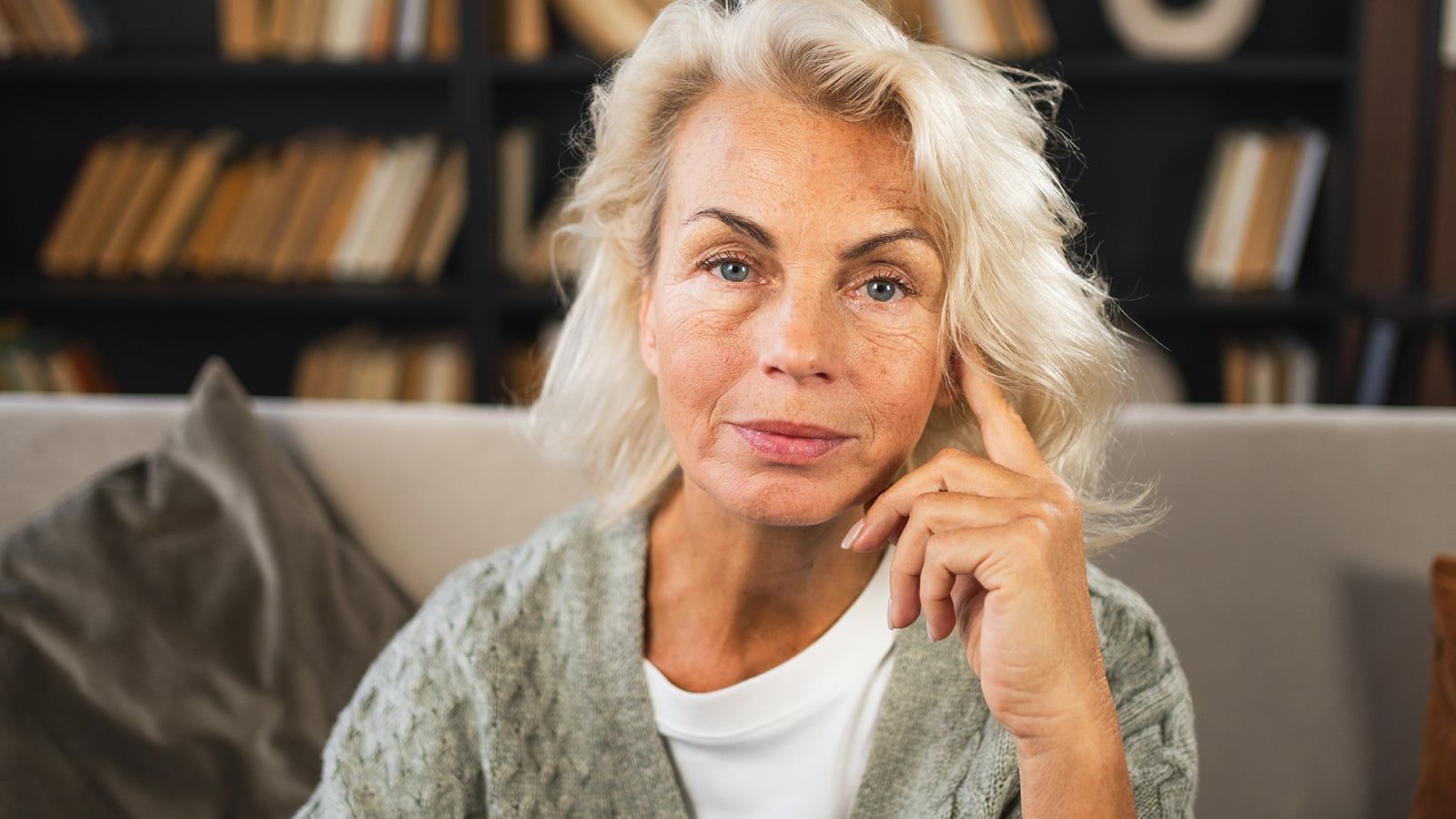 Portrait of confident stylish European middle aged senior woman. Older mature 60s lady smiling at home. Happy attractive senior female looking camera close up face headshot portrait. Happy people
