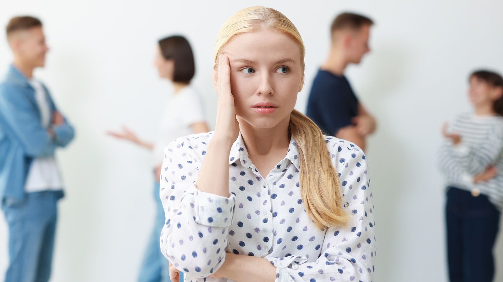 Woman not enjoying a social gathering.