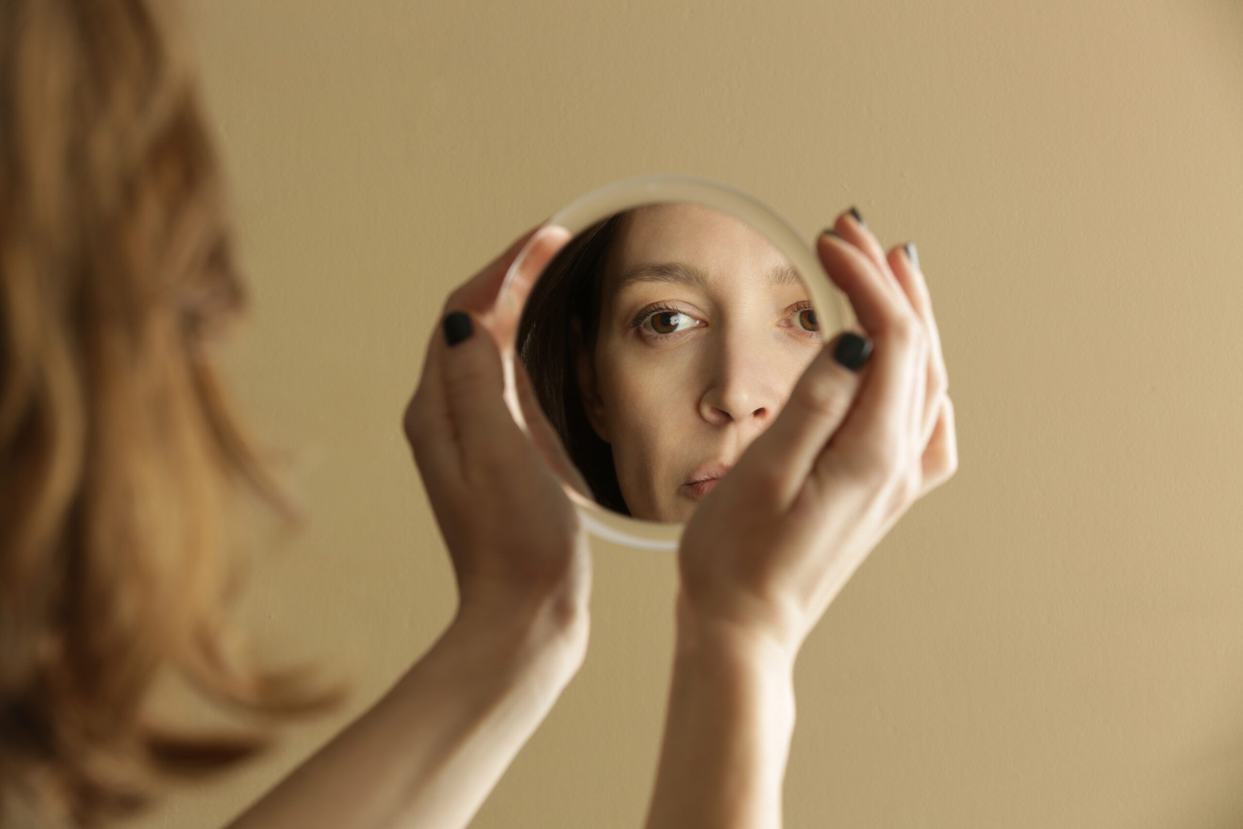 A woman with the fear of being seen.